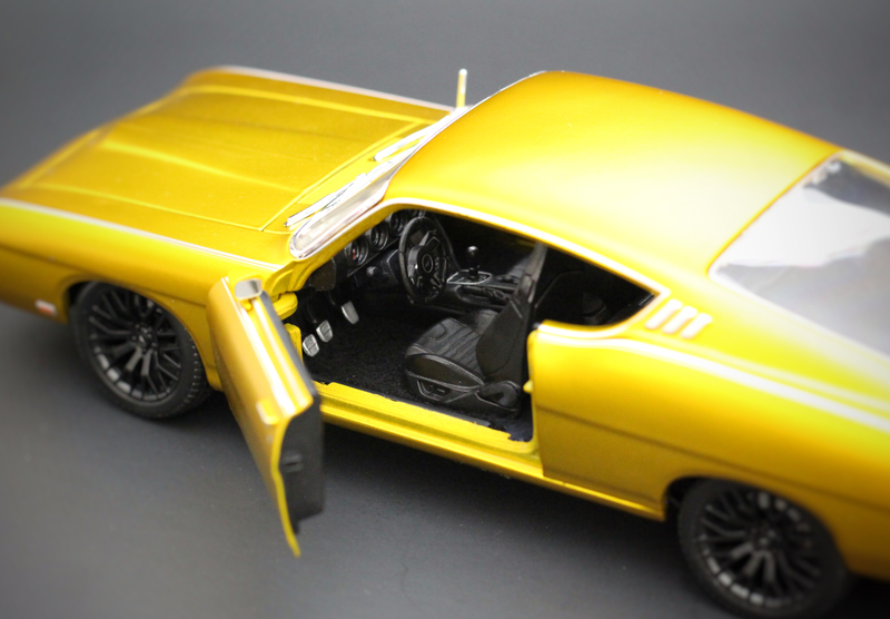 Illustration for article titled Car Week: Custom 1/18 Maisto Ford Torino Talladega Coyote